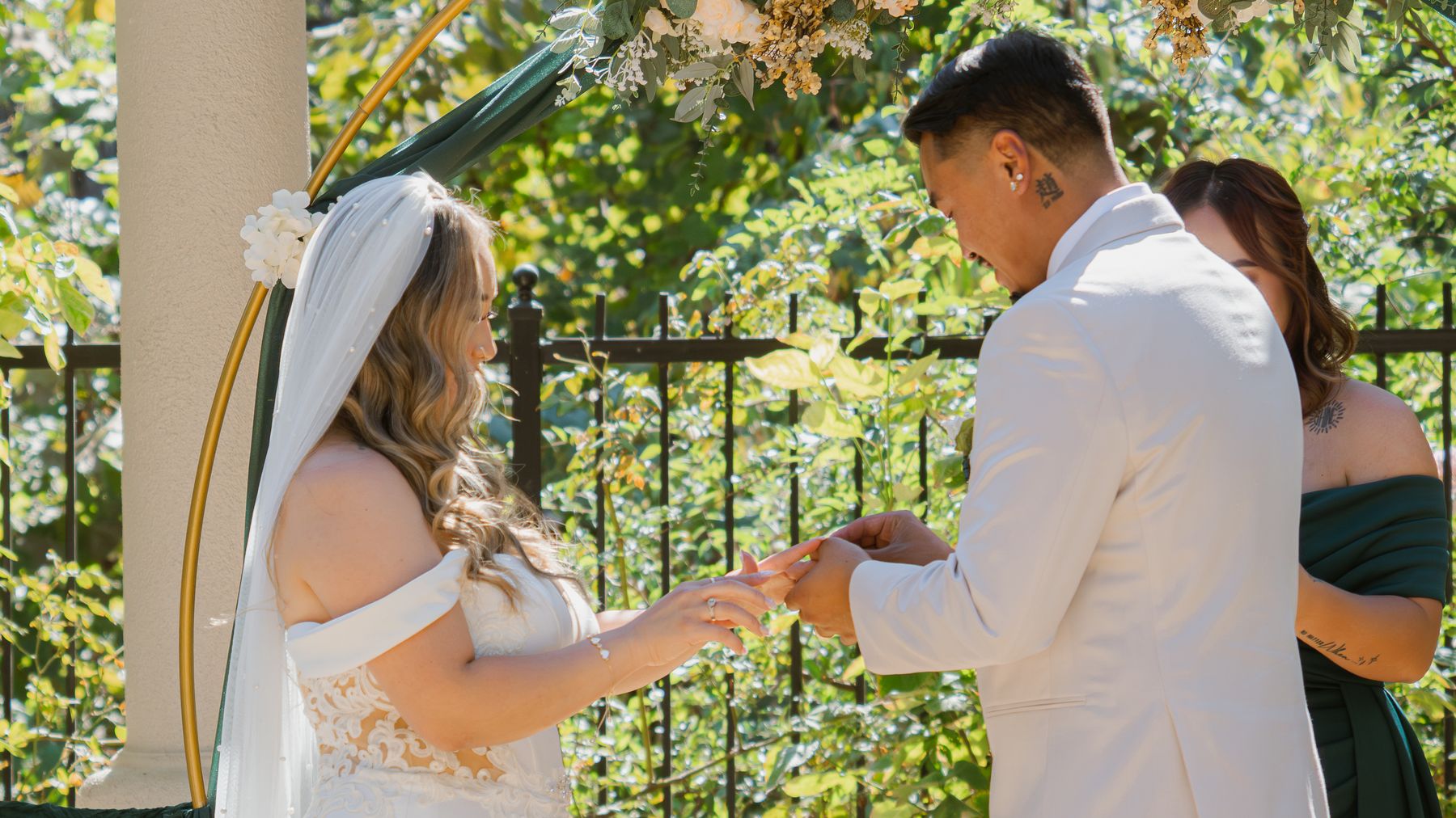 Timmy places the ring on Heaven’s finger during the ceremony