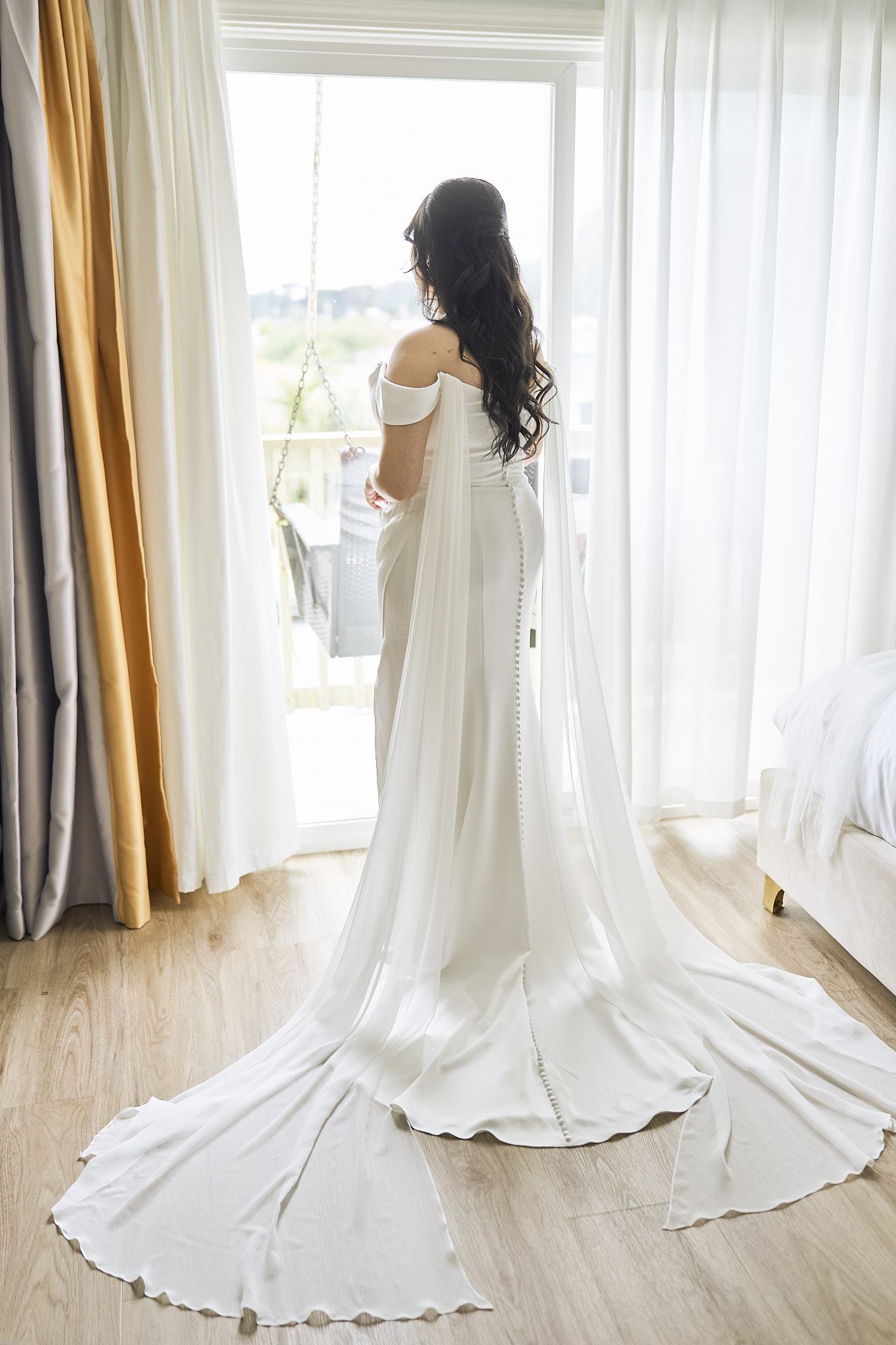 C in her wedding dress before the first look