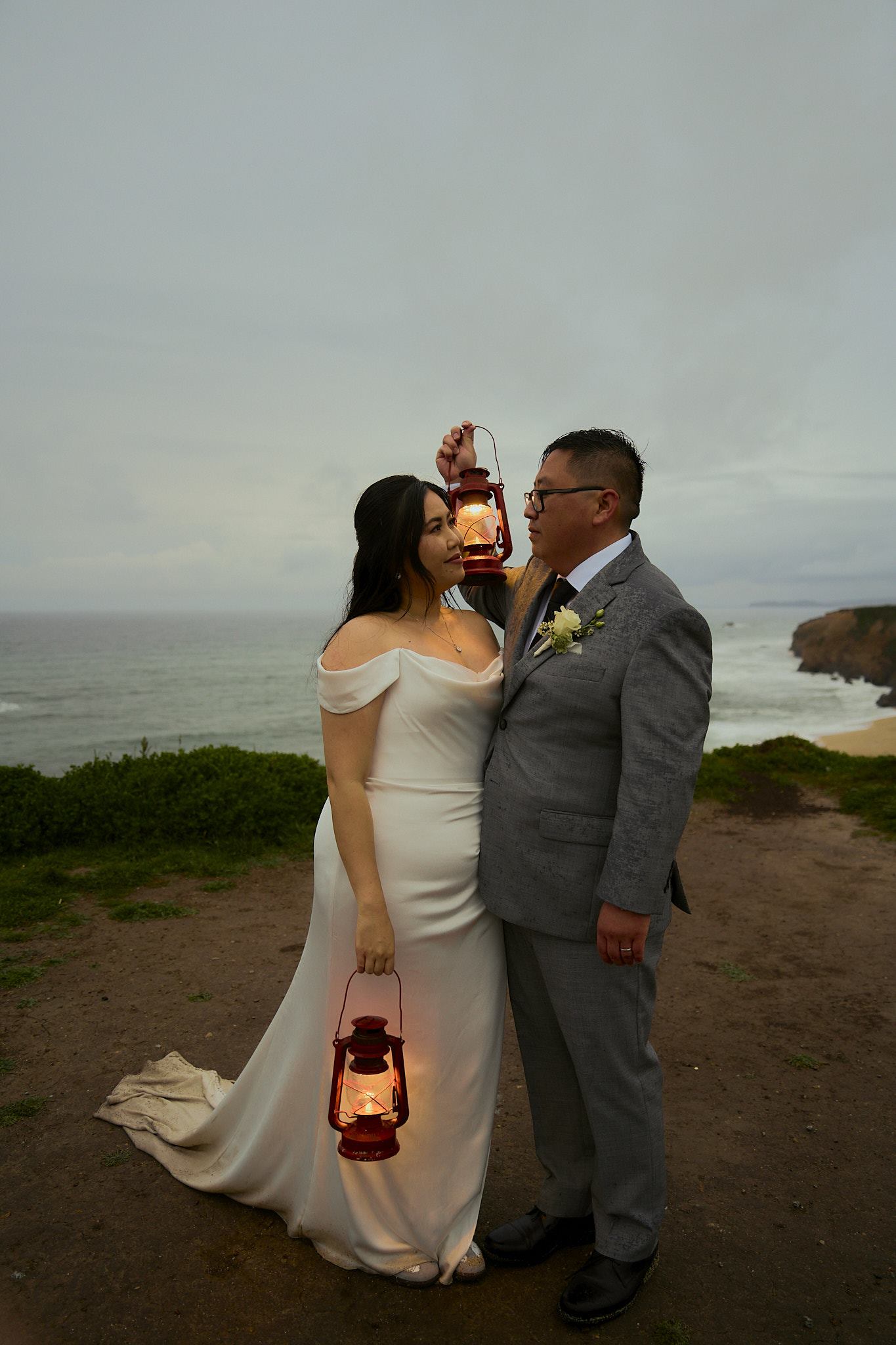 D + C sharing a lantern-lit moment at the end of the day